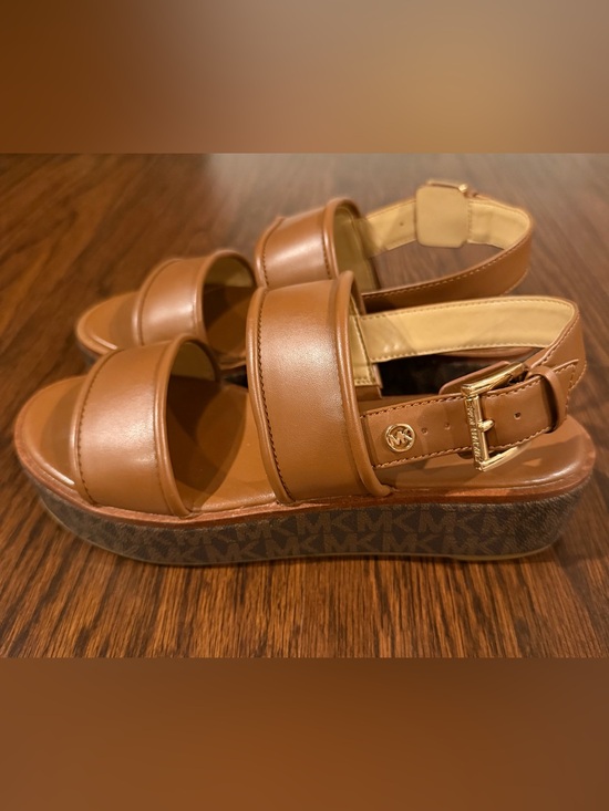 Michael Kors Shoes - Michael Kors Brown Leather Platform Sandals with MK-Print Sole